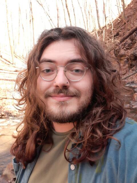 Johnathan smiling at camera