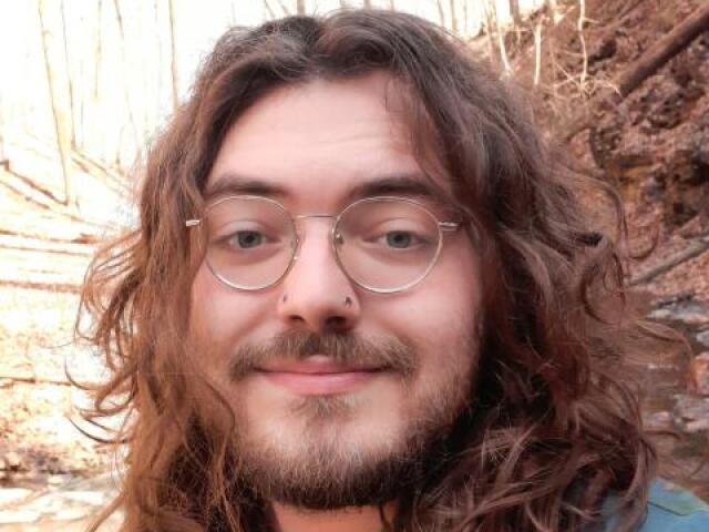 Johnathan smiling at camera