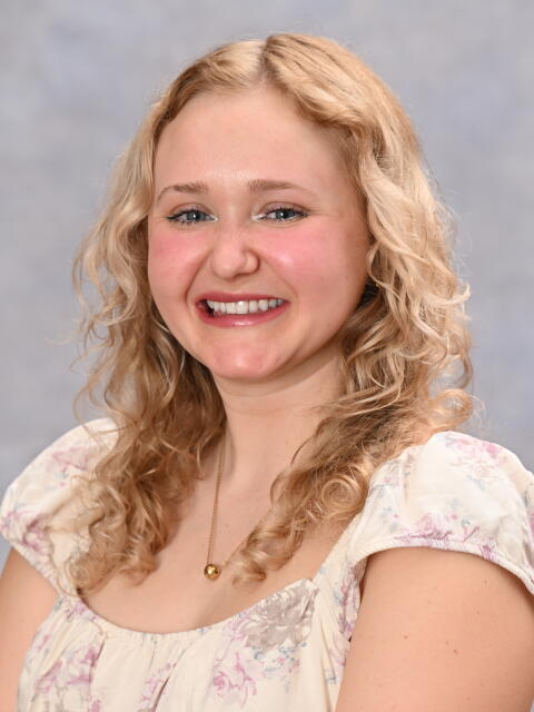 Kaylee Farr smiling at camera