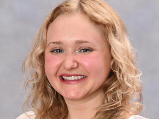 Kaylee Farr smiling at camera